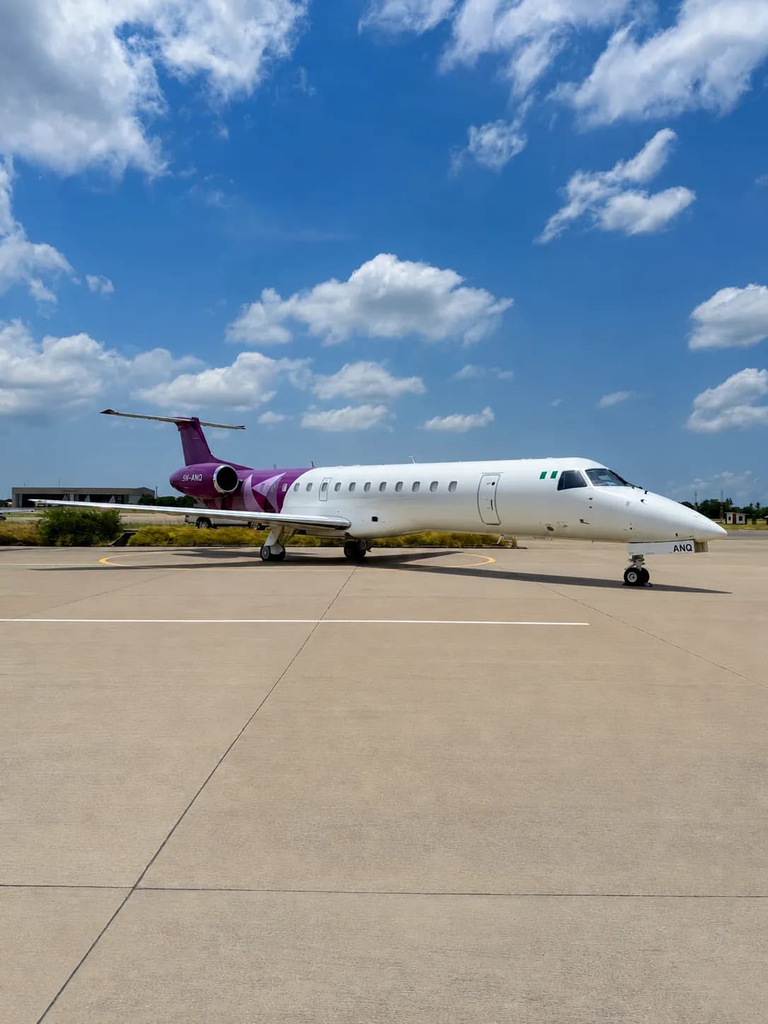 FlyPJX ERJ-140 aircraft on the apron